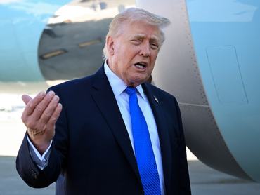 WEST PALM BEACH, FLORIDA - MARCH 23: U.S. President Donald Trump speaks to reporters before boarding Air Force One at Palm Beach International Airport on March 23, 2026 in West Palm Beach, Florida. President Trump is traveling to Tennessee before returning to Washington. (Photo by Roberto Schmidt/Getty Images)