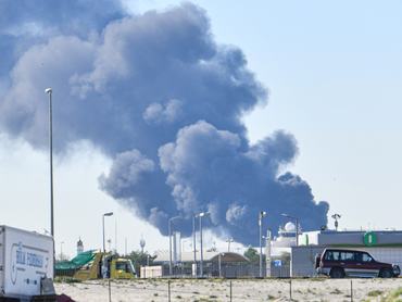 KUWAIT CITY, KUWAIT - APRIL 01: Smoke rises after an Iranian drone attack struck fuel tanks at Kuwait International Airport in Kuwait City, Kuwait on April 01, 2026. An Iranian drone attack struck fuel tanks at Kuwait International Airport triggering a large fire but causing no casualties, according to Kuwait's state â news agency KUNA. (Photo by Stringer/Anadolu via Getty Images)